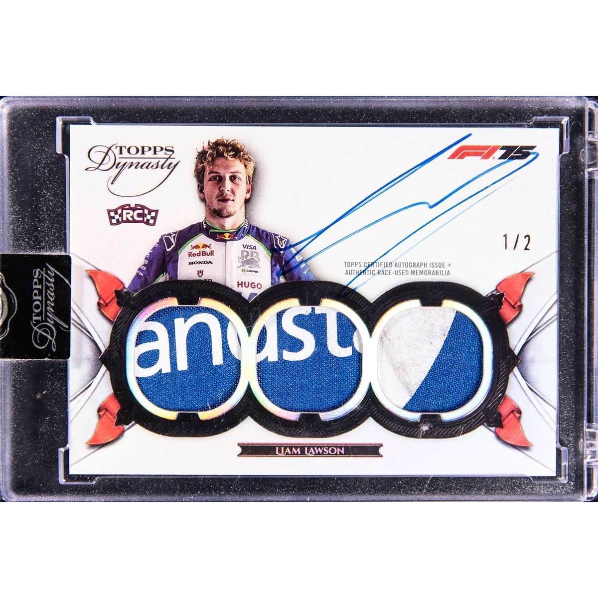 2025 Topps Dynasty F1 Triple Relic Liam Lawson Autograph Race-Used Patch RC 1/2